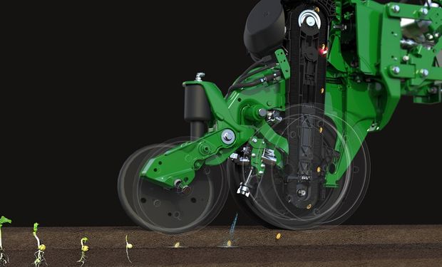 Uma plantadora de campo equipada com 24 robôs ExactShot pode plantar 240 sementes de milho por segundo. (foto - John Deere)